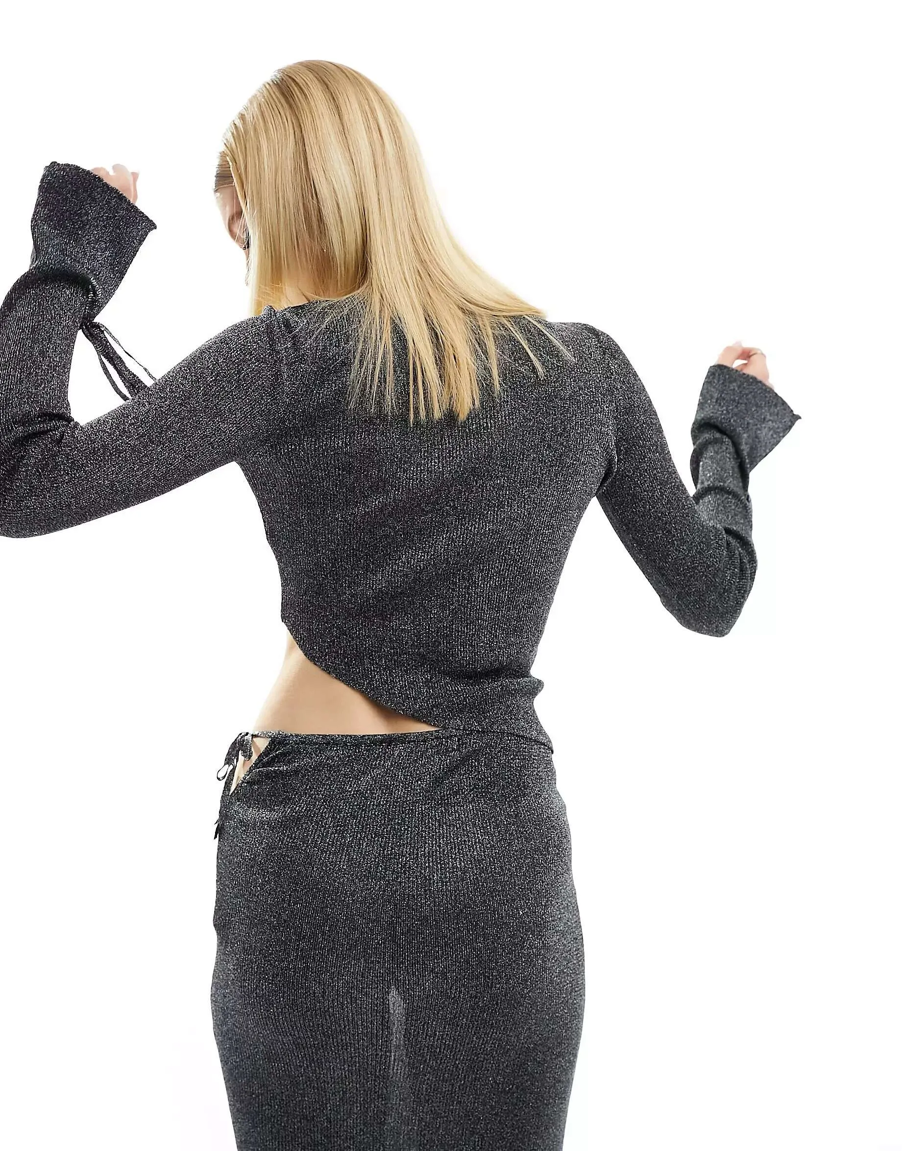 Bershka Knitted Asymmetrical Hem Jumper in Black with Sequins